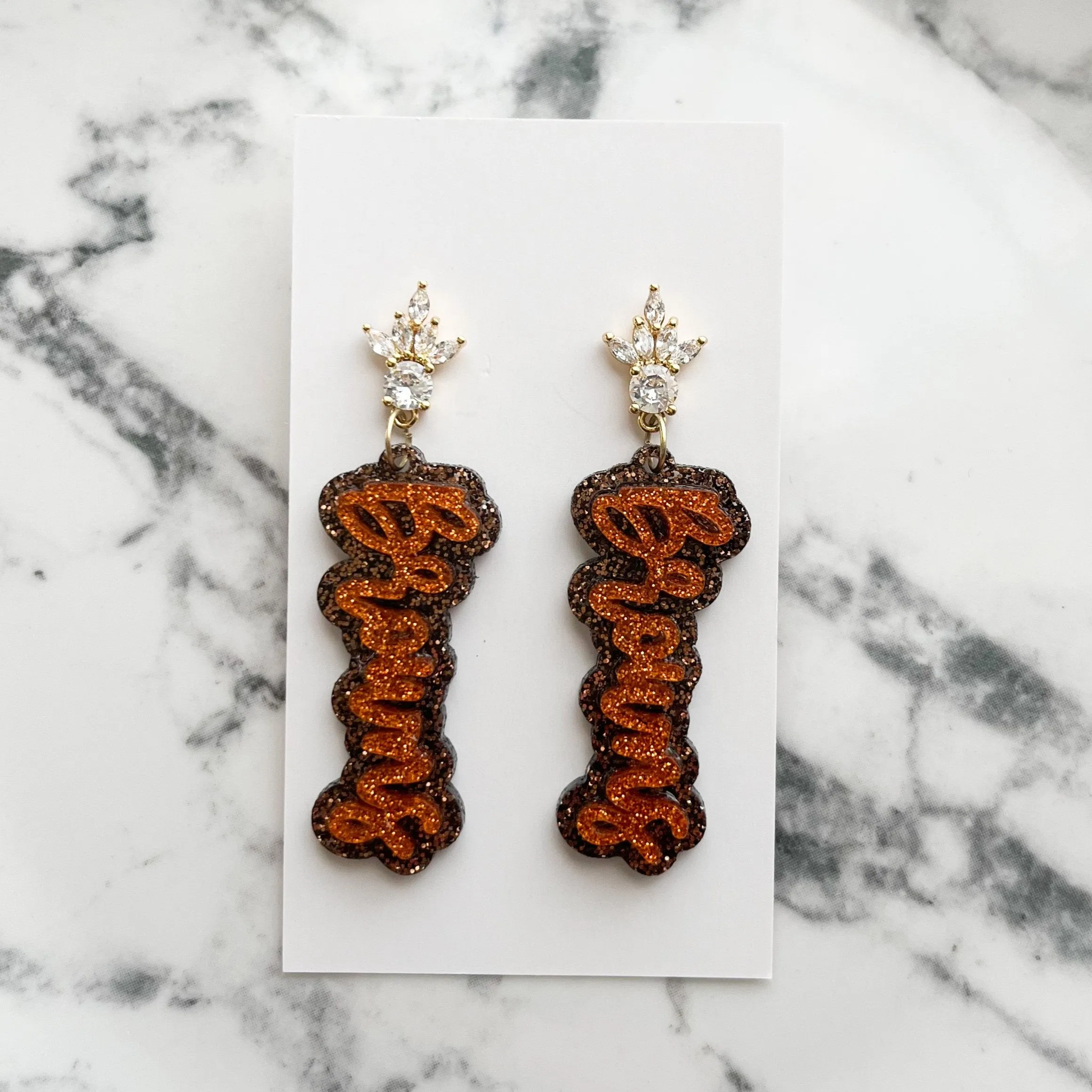 Cubic Zirconia Glitter Browns Script Earrings