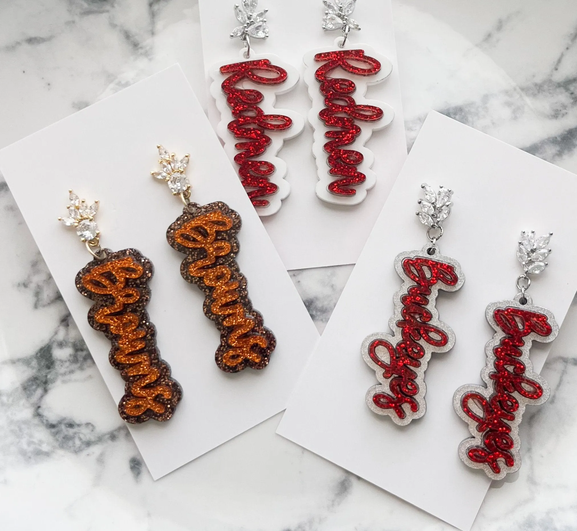 Cubic Zirconia Glitter Browns Script Earrings