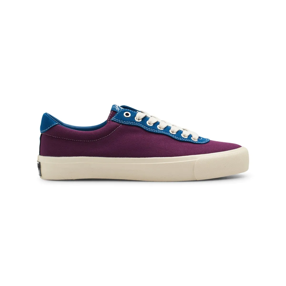 Certainly! An optimized title for the e-commerce product could be:

Last Resort AB VM001 Low Top Canvas Skateshoes in Plum and Dirty Blue - Julian Smith Edition

This title includes key modifiers and maintains clarity while highlighting important features of the product.