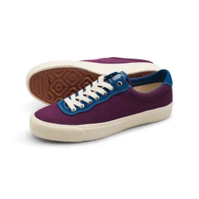 Certainly! An optimized title for the e-commerce product could be:

Last Resort AB VM001 Low Top Canvas Skateshoes in Plum and Dirty Blue - Julian Smith Edition

This title includes key modifiers and maintains clarity while highlighting important features of the product.